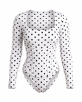 Polka dot square-neck long-sleeve bodysuit and detachable corset set on white background